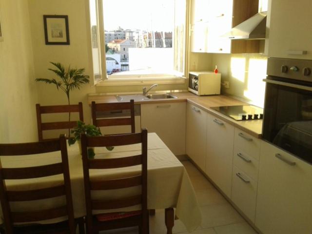 Kuchyňa alebo kuchynka v ubytovaní Apartment ML