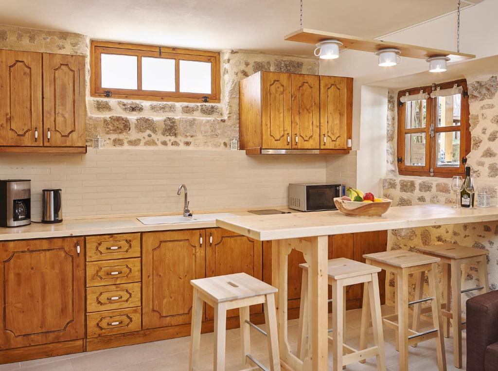 Kuchyň nebo kuchyňský kout v ubytování Helios Garden Boutique Apartments