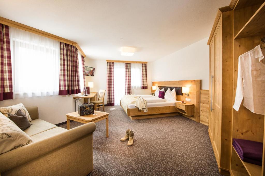 Postel nebo postele na pokoji v ubytování Hotel Salzburgerhof
