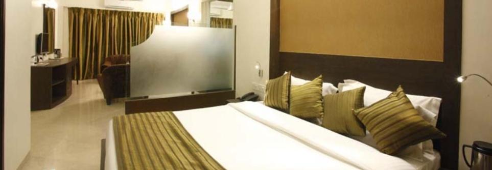 Postel nebo postele na pokoji v ubytování Hotel Plaza