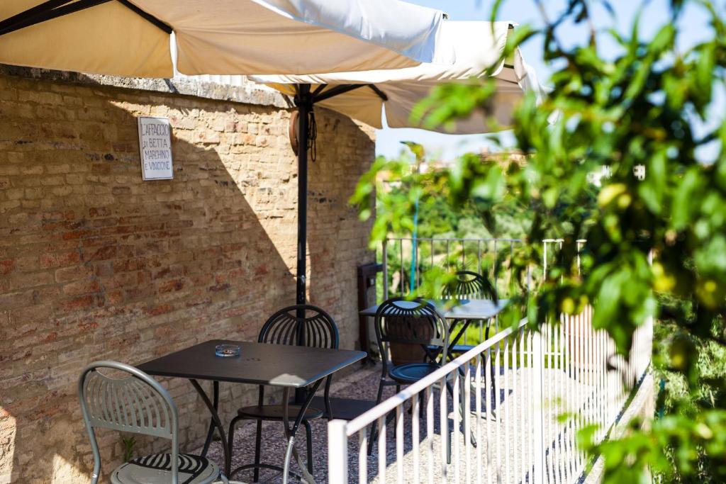 Patio nebo venkovní prostory v ubytování Hotel Porta Romana di Luce Hotels