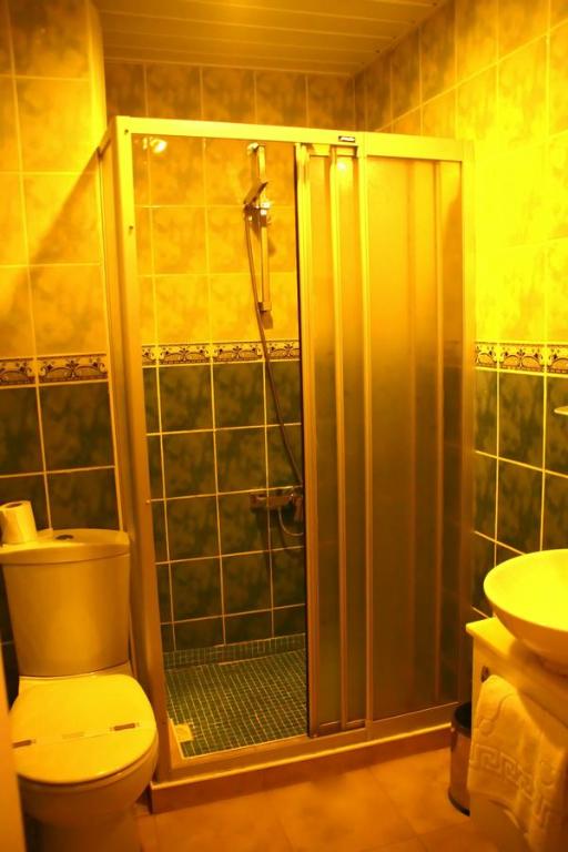 Koupelna v ubytování Divas Hotel