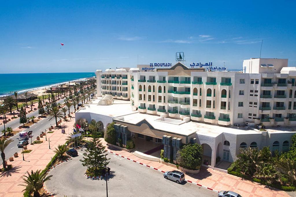 an aerial view of a hotel and the beach at El Mouradi Hammamet in Hammamet