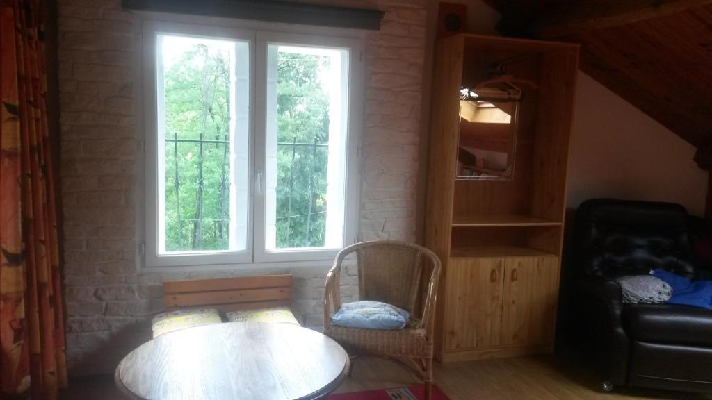 Posezení v ubytování Chambres d'Hôtes Le Perdigon