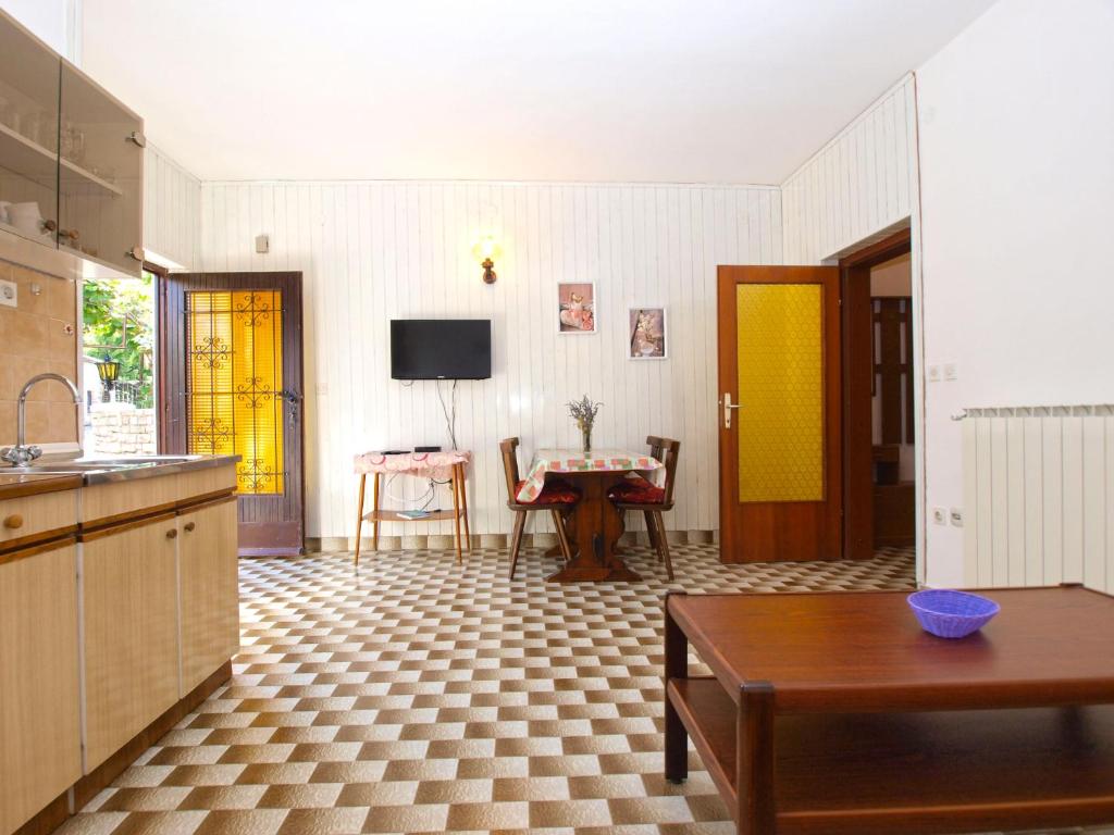 Televízia a/alebo spoločenská miestnosť v ubytovaní Apartments Kosovka 1398