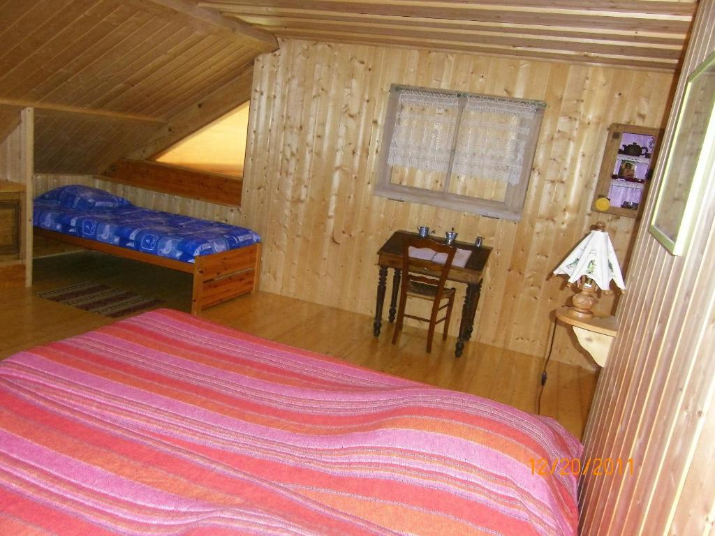 Postel nebo postele na pokoji v ubytování Che'Val d'Amour
