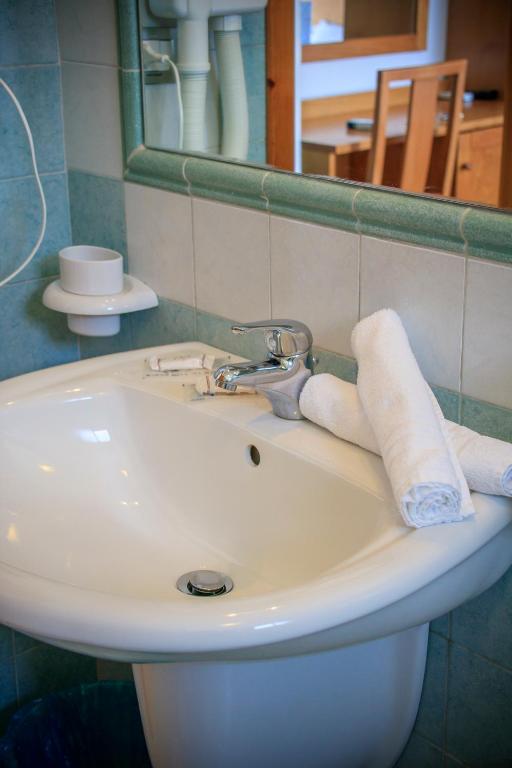 Koupelna v ubytování Abbaidda Hotel