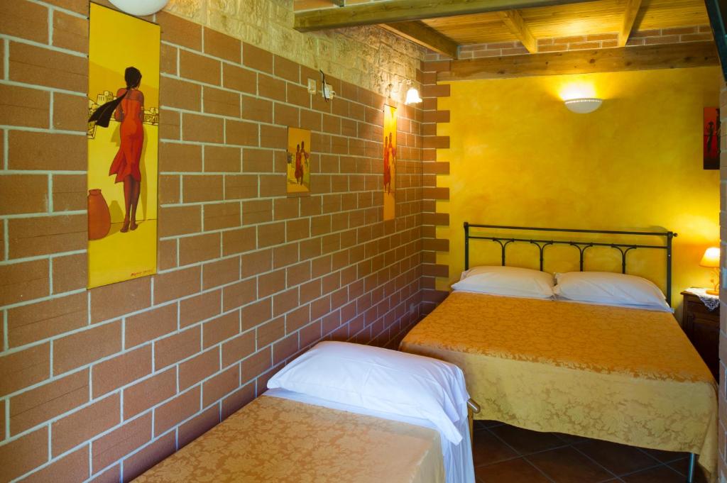 Postel nebo postele na pokoji v ubytování Country Apartments