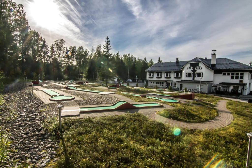 Zahrada ubytování Aateli Lakeside Chalets - former Vuokatti Suites