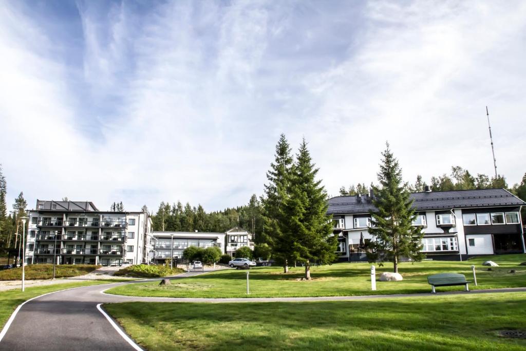 Zahrada ubytování Aateli Lakeside Chalets - former Vuokatti Suites