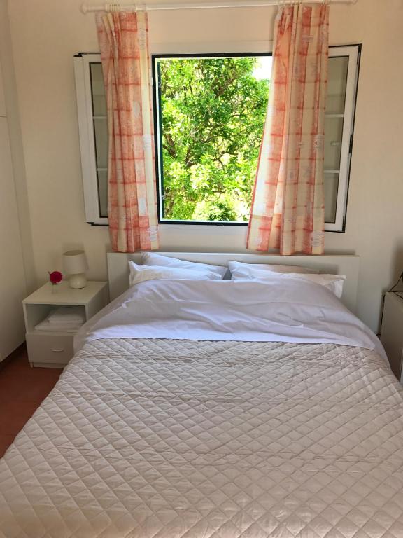 Postel nebo postele na pokoji v ubytování Inglessata Rose