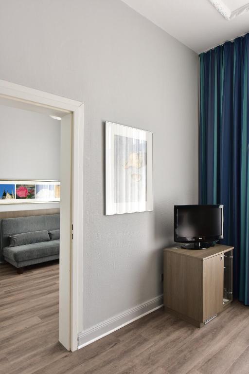 Postel nebo postele na pokoji v ubytování Frühlings-Hotel