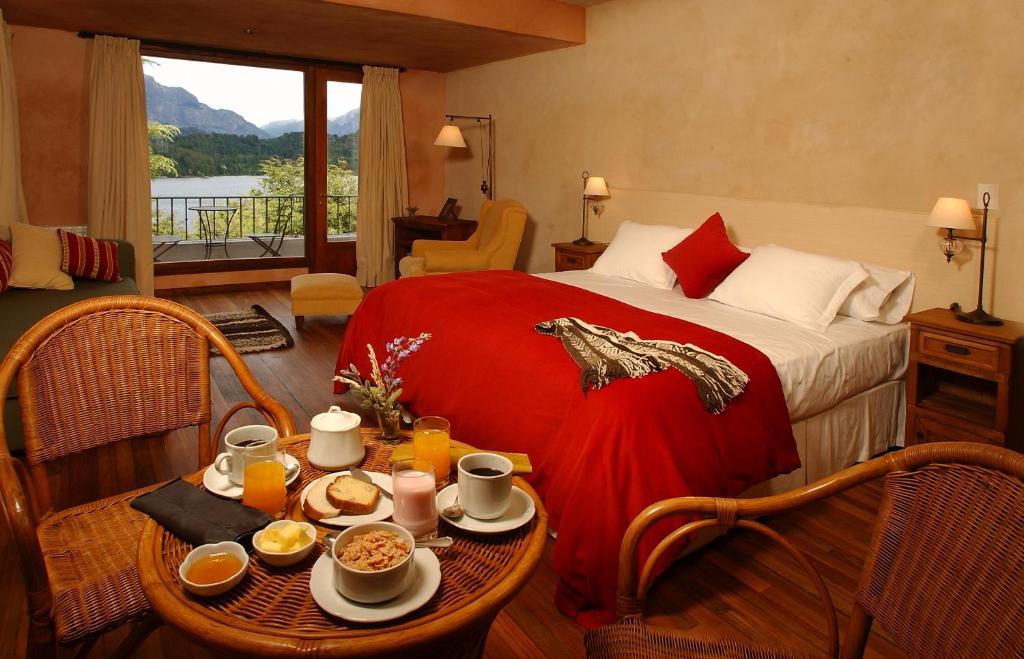 Postel nebo postele na pokoji v ubytování Aldebaran Hotel & Spa