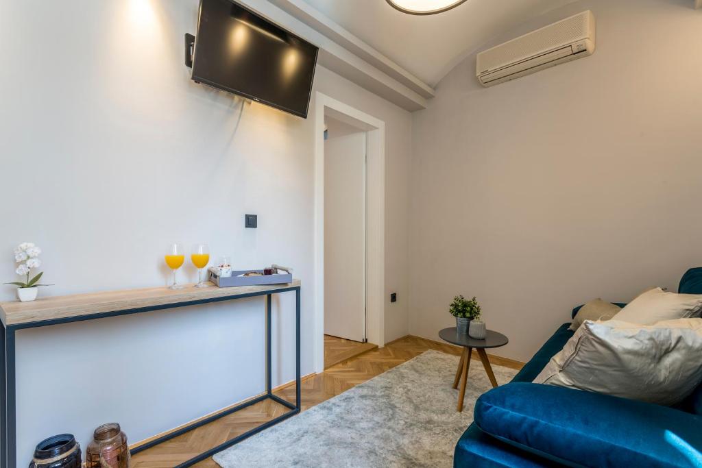 TV a/nebo společenská místnost v ubytování Central Rooms Split