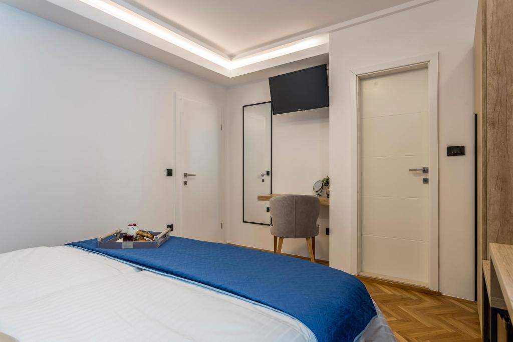 Postel nebo postele na pokoji v ubytování Central Rooms Split