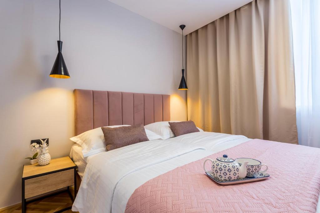 Postel nebo postele na pokoji v ubytování Central Rooms Split