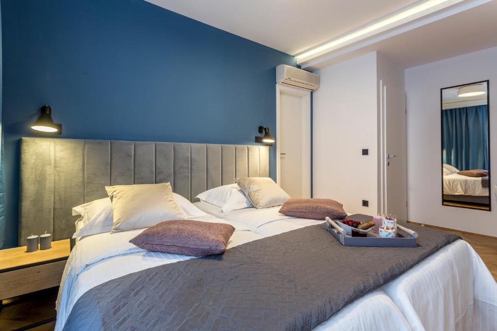 Postel nebo postele na pokoji v ubytování Central Rooms Split