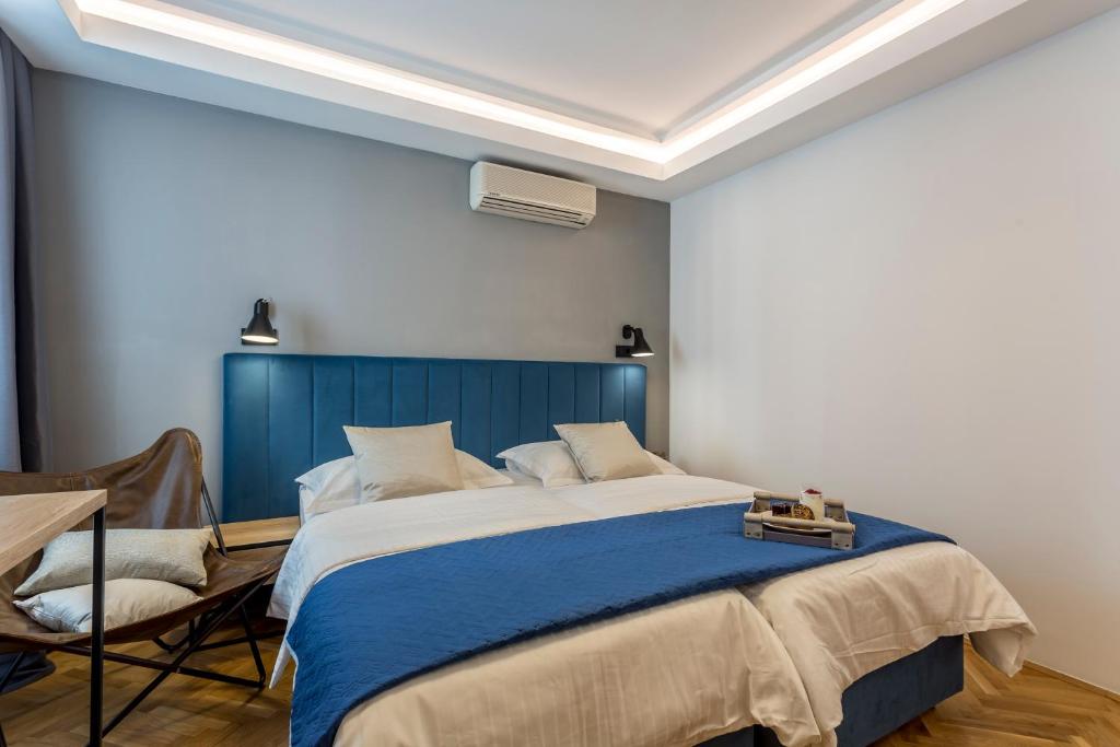 Postel nebo postele na pokoji v ubytování Central Rooms Split