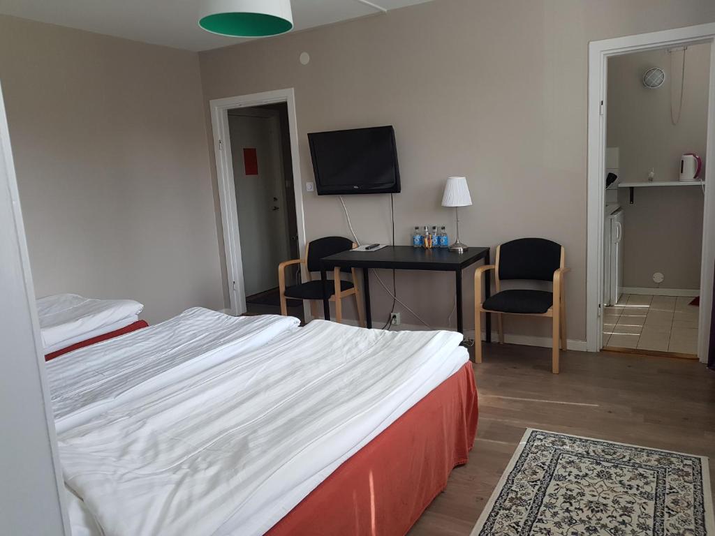 Postel nebo postele na pokoji v ubytování Hotel Tre Stockar