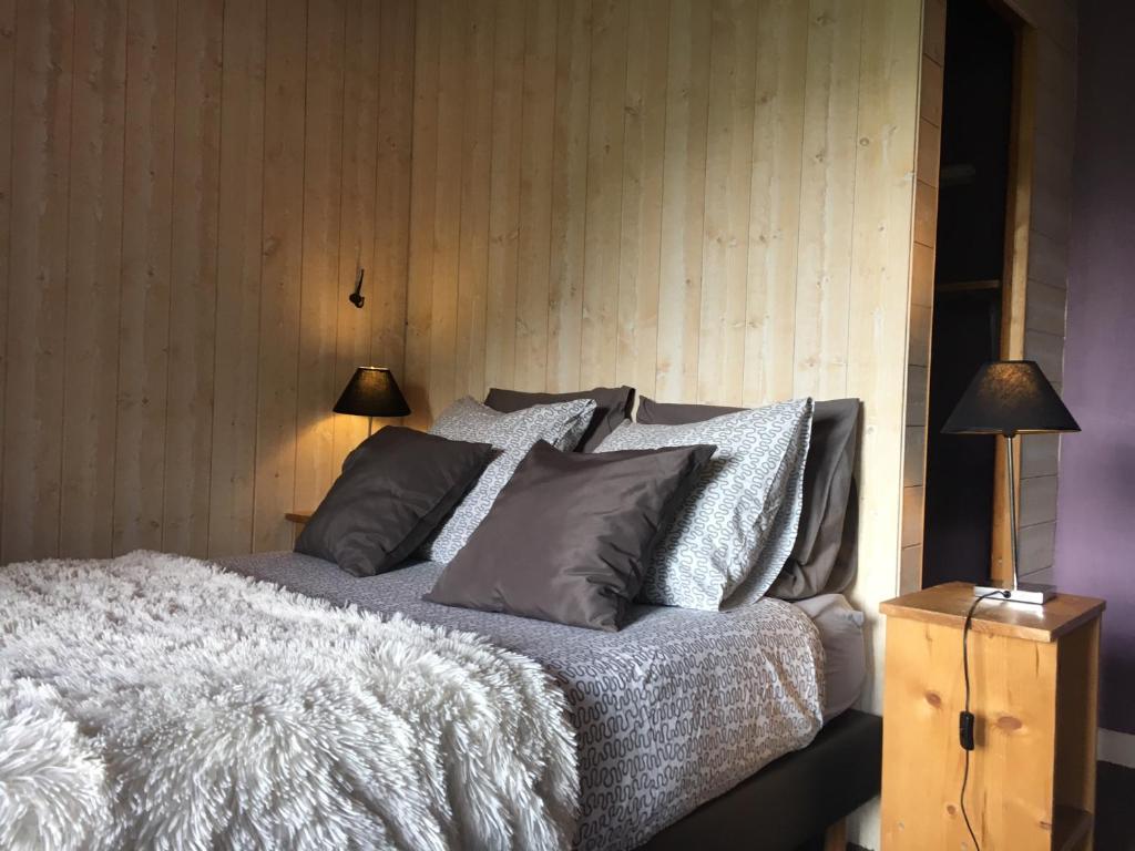 Postel nebo postele na pokoji v ubytování Hotel Le Beau Site