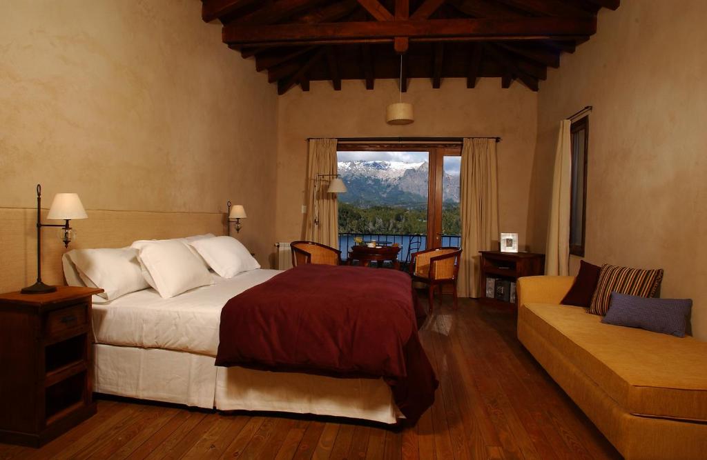 Postel nebo postele na pokoji v ubytování Aldebaran Hotel & Spa