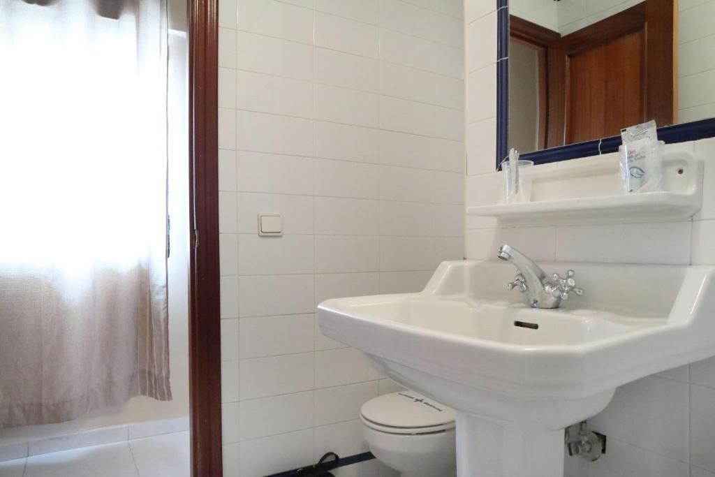 Łazienka w obiekcie Hostal Victoria