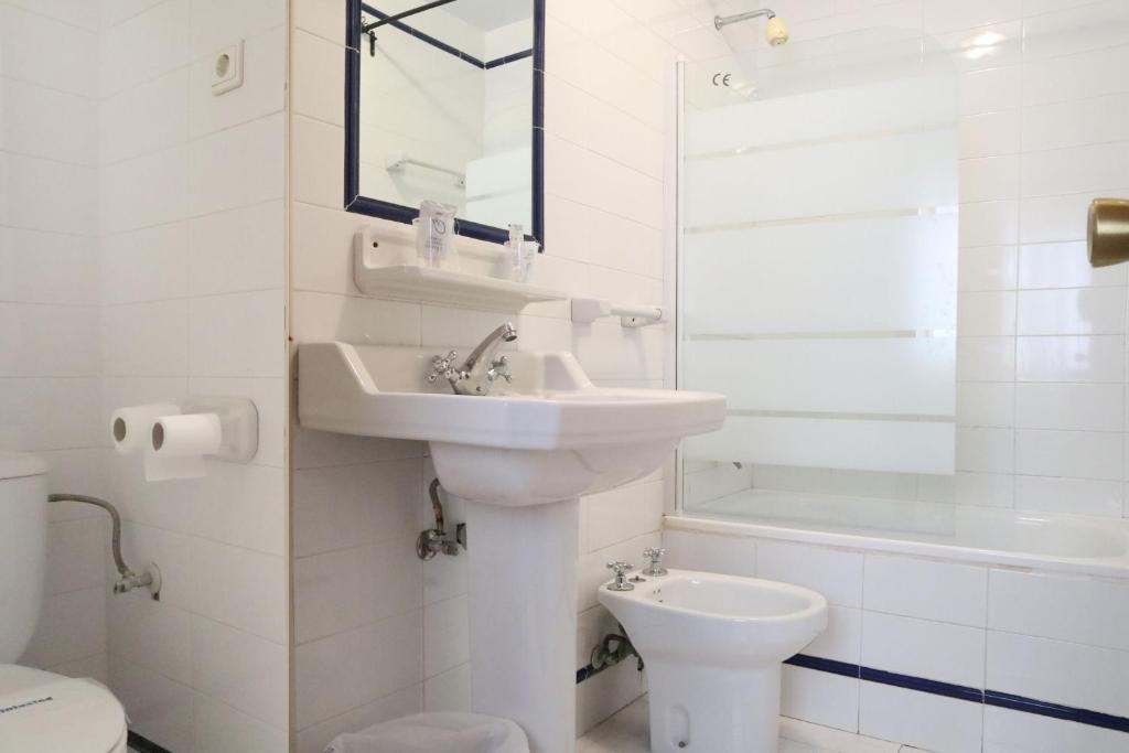 Łazienka w obiekcie Hostal Victoria