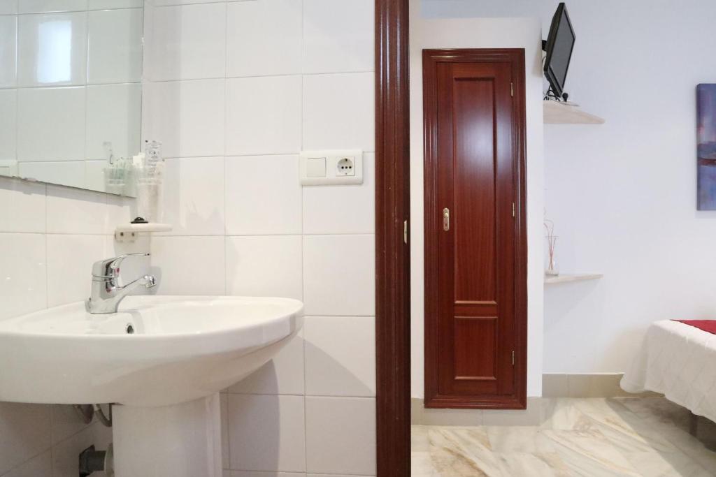 Łazienka w obiekcie Hostal Victoria
