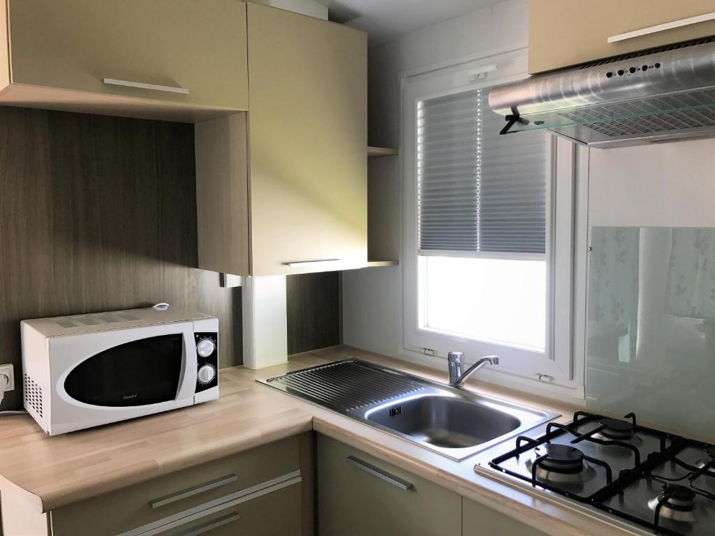 Kuchyň nebo kuchyňský kout v ubytování Camping Pirinenc