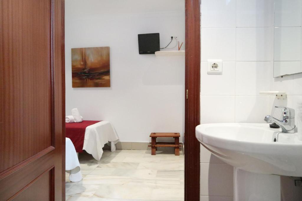 Łazienka w obiekcie Hostal Victoria