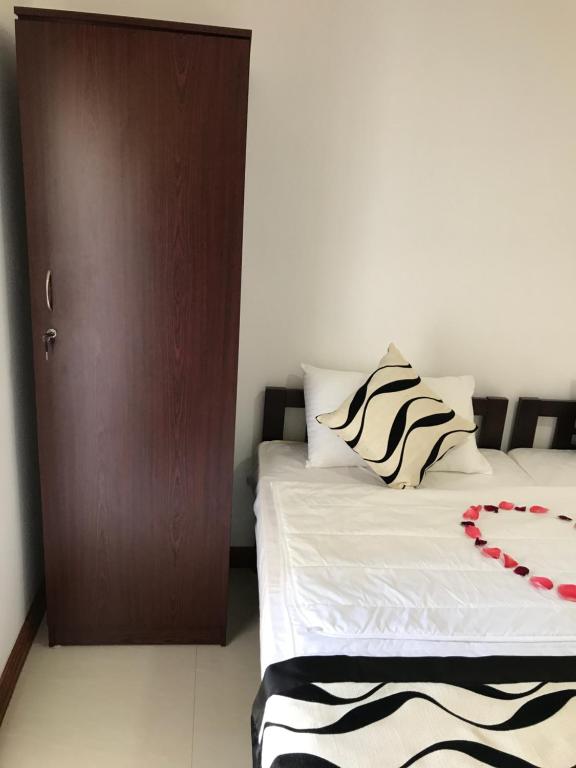 Voodi või voodid majutusasutuse Aerizo bungalow & Tours toas