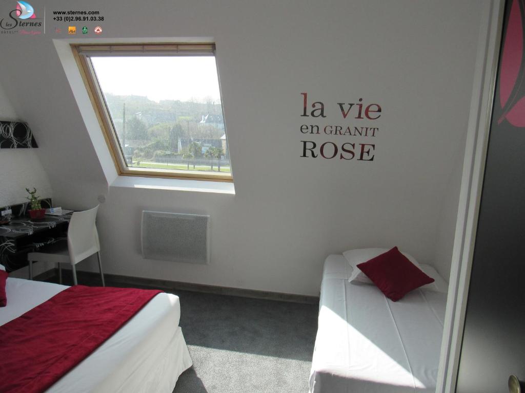 Postel nebo postele na pokoji v ubytování Citotel Les Sternes