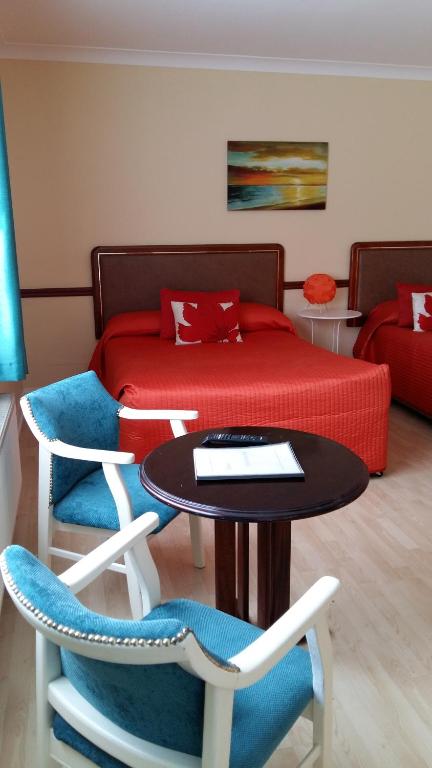 Posezení v ubytování Abacus Guesthouse