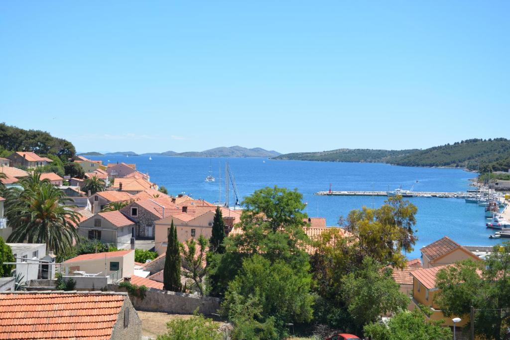 a view of a town with a harbor and a body of water at Apartment Blue in Sali