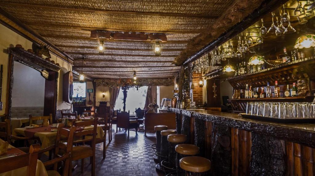 Lounge nebo bar v ubytování Hosteria Rumipamba De Las Rosas