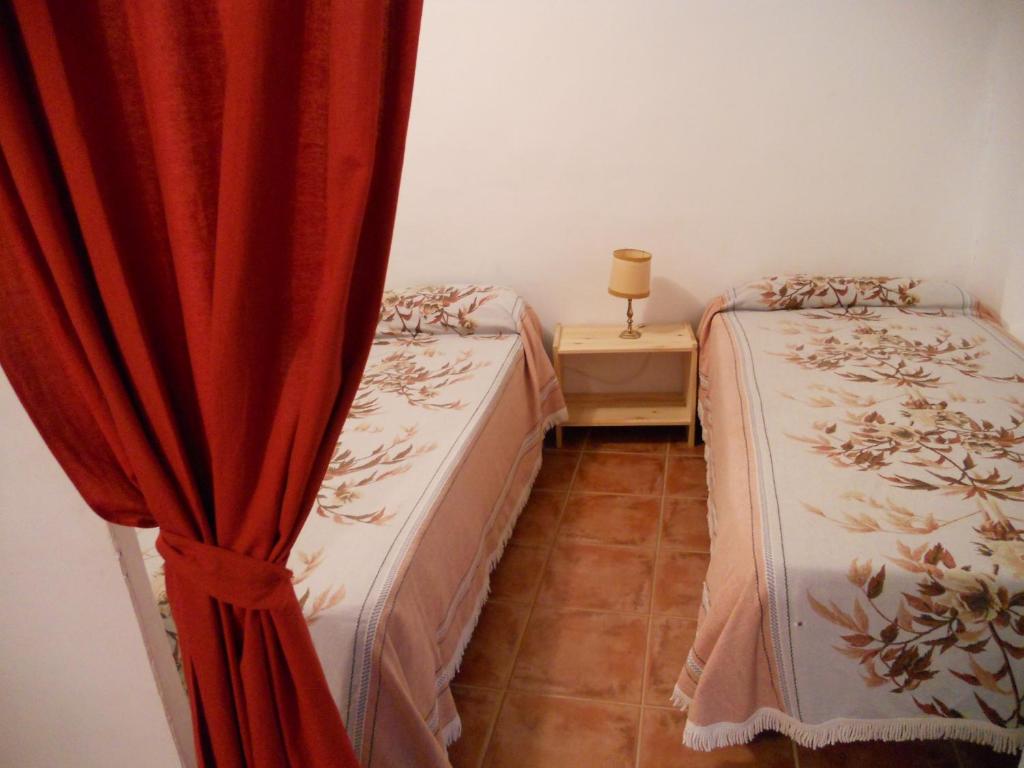 Postel nebo postele na pokoji v ubytování Casa Rosalia