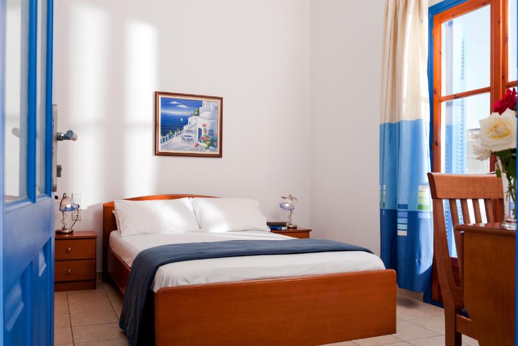 Postel nebo postele na pokoji v ubytování Hotel Eleni