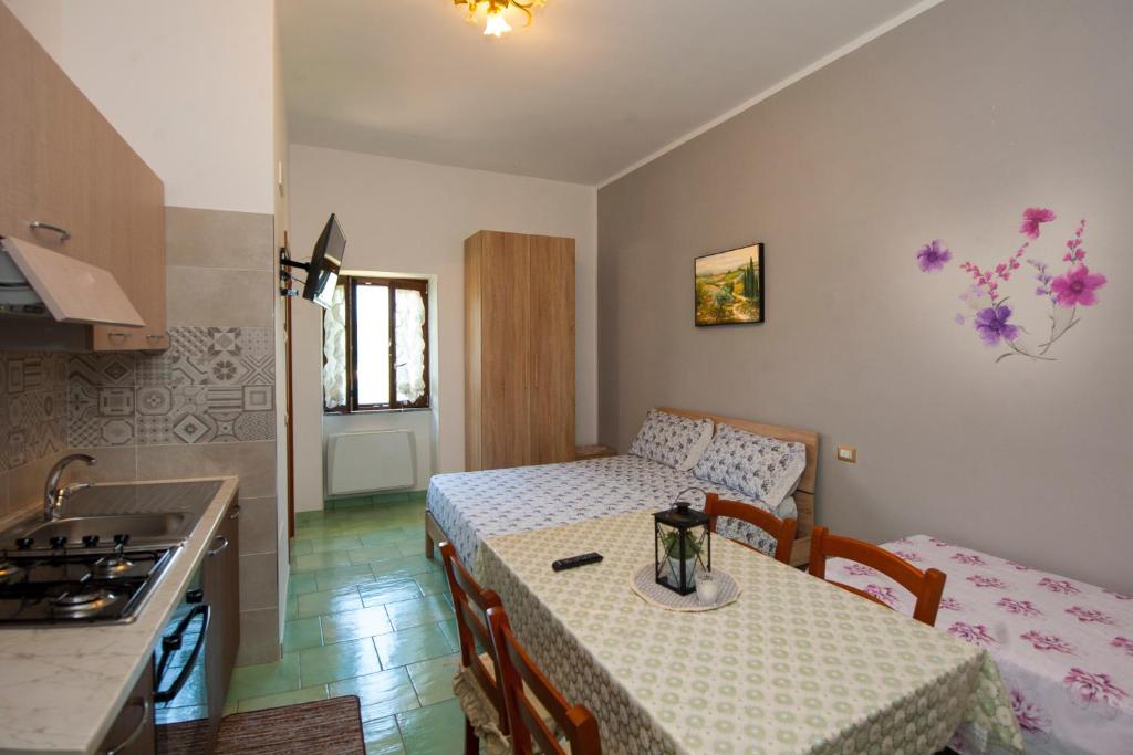 Kuchyň nebo kuchyňský kout v ubytování Case Vacanze Rossi