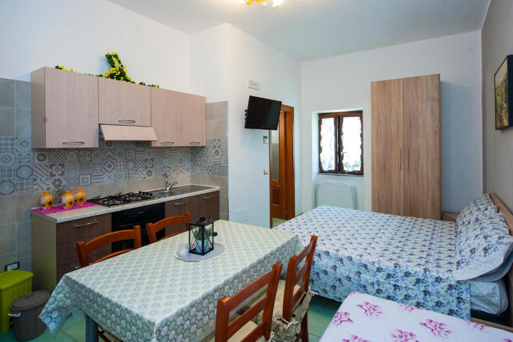 Kuchyň nebo kuchyňský kout v ubytování Case Vacanze Rossi