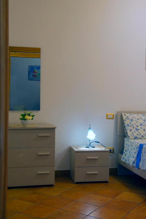 Postel nebo postele na pokoji v ubytování Case Vacanze Rossi