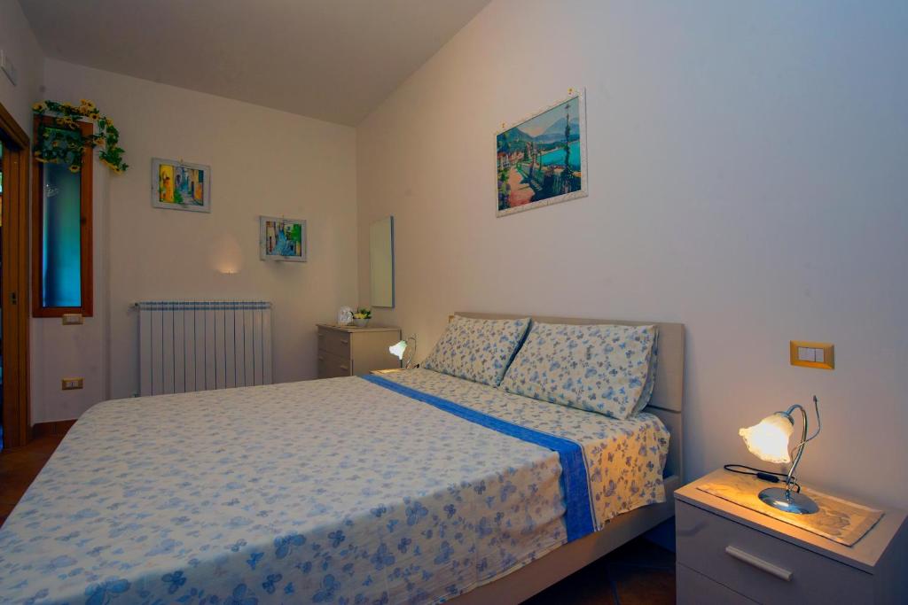 Postel nebo postele na pokoji v ubytování Case Vacanze Rossi