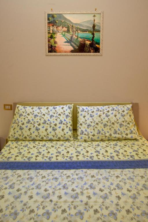 Postel nebo postele na pokoji v ubytování Case Vacanze Rossi
