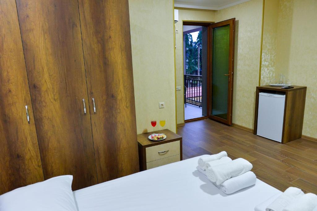 Voodi või voodid majutusasutuse Hotel Lion toas