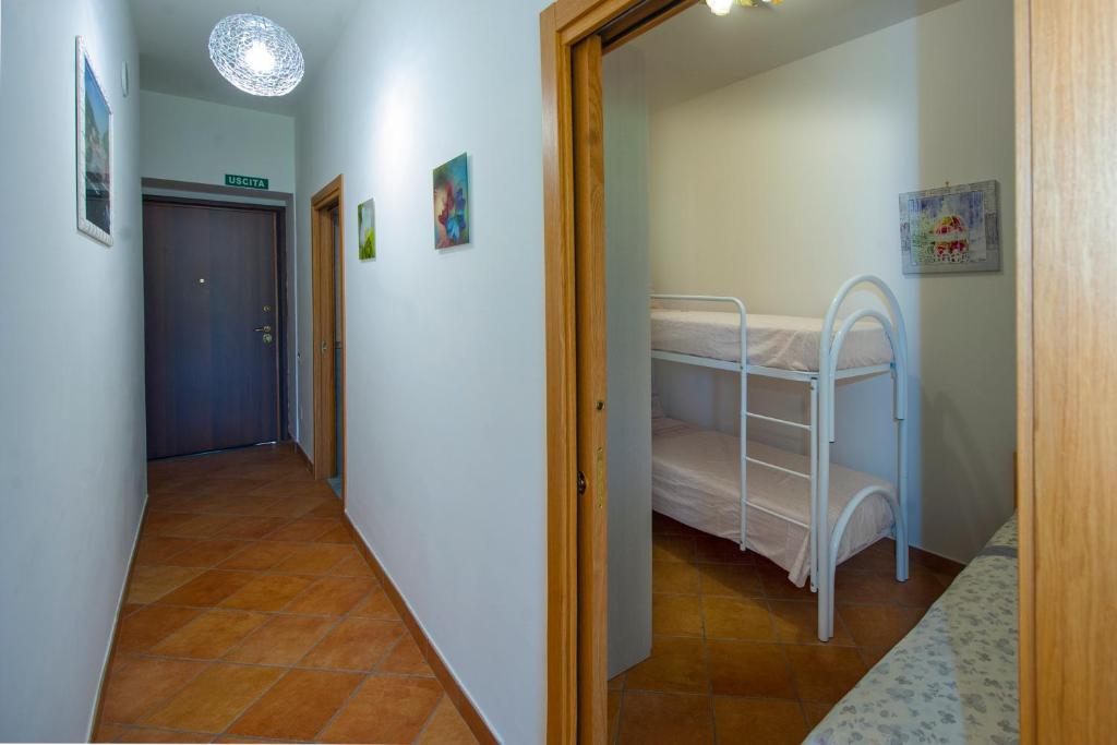 Postel nebo postele na pokoji v ubytování Case Vacanze Rossi