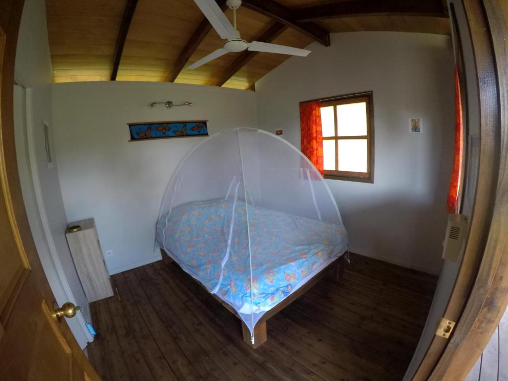 Postel nebo postele na pokoji v ubytování Painapaopao Backpacker