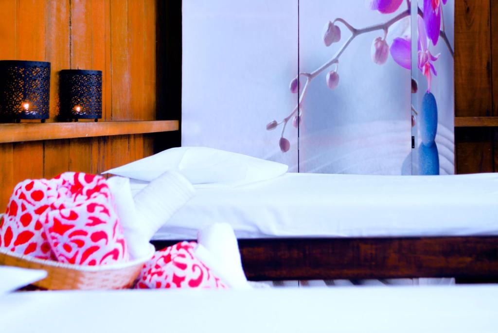 Postel nebo postele na pokoji v ubytování Hotel Utüane