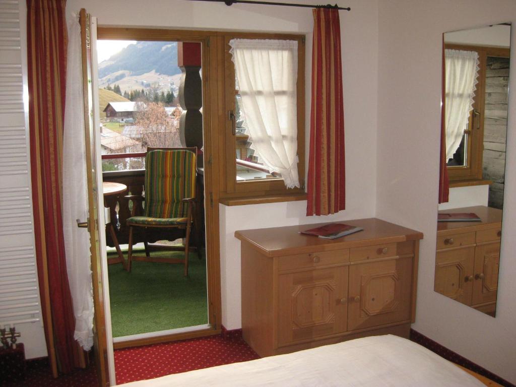Postel nebo postele na pokoji v ubytování Gästehaus Walserheimat
