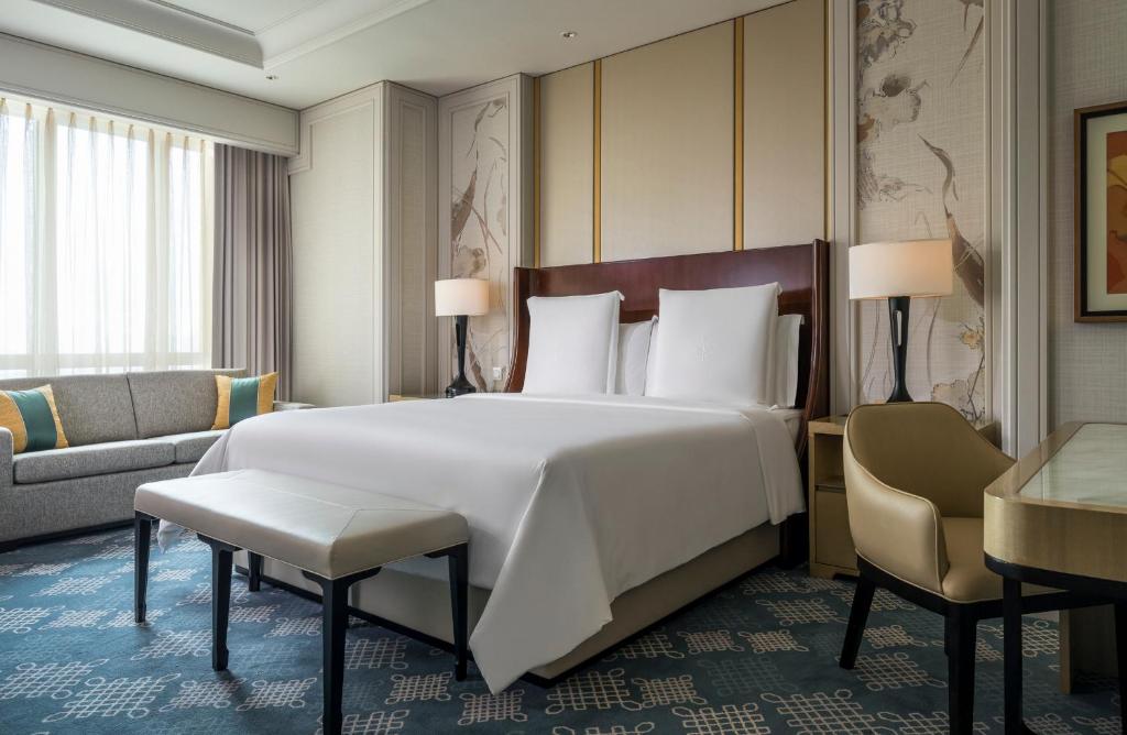 Postel nebo postele na pokoji v ubytování Four Seasons Hotel Macao
