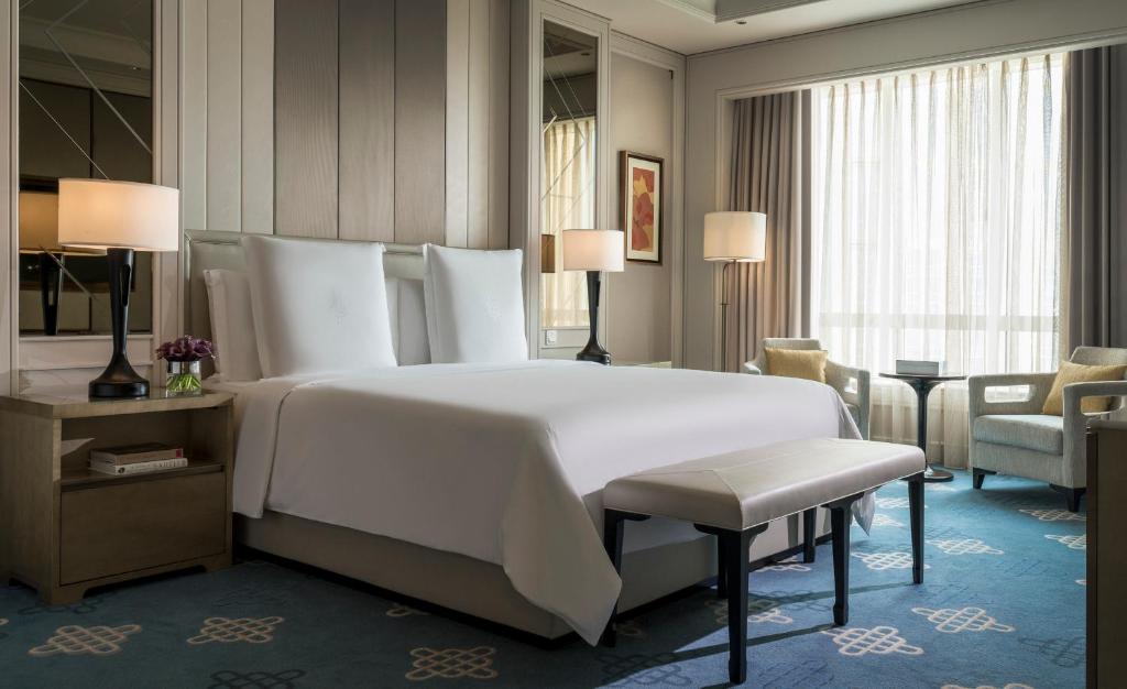 Postel nebo postele na pokoji v ubytování Four Seasons Hotel Macao