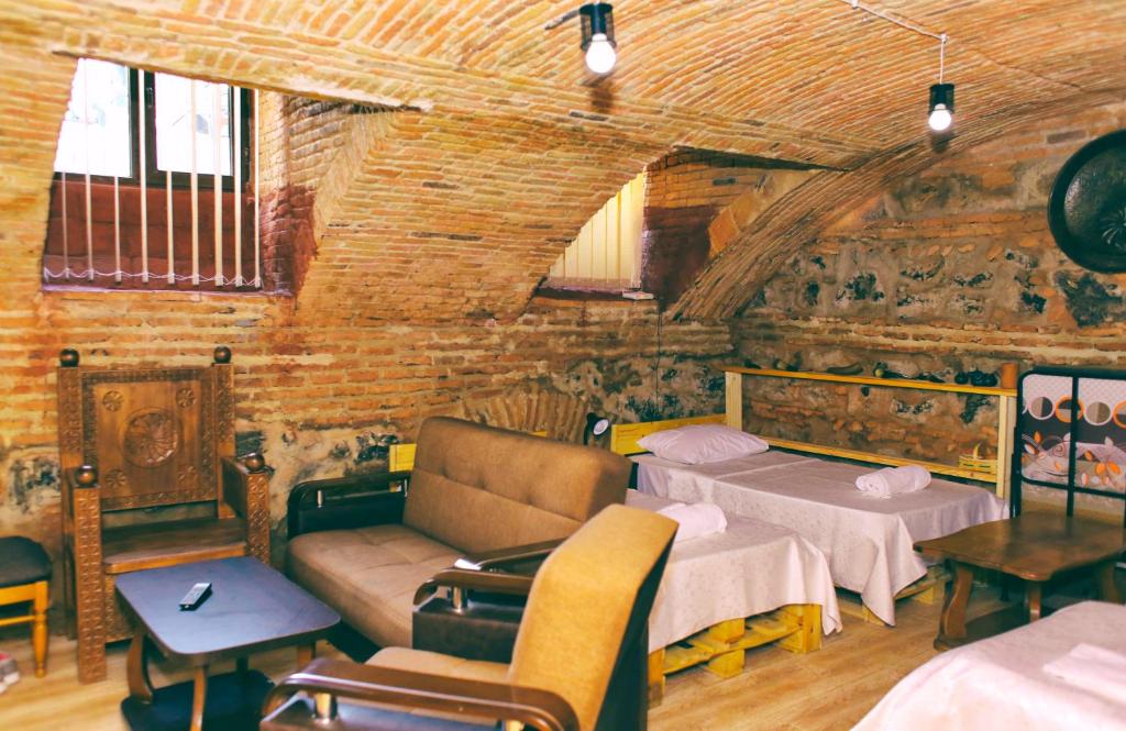 Postel nebo postele na pokoji v ubytování Guest House Kakabadzeebi 9